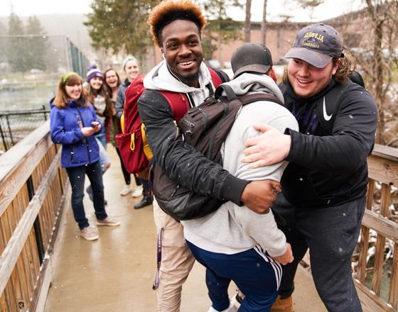 Students out by Merrill Field. 